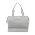 The Weekender Mini Travel Bag With Drop Bottom