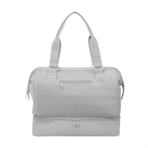 The Weekender Mini Travel Bag With Drop Bottom
